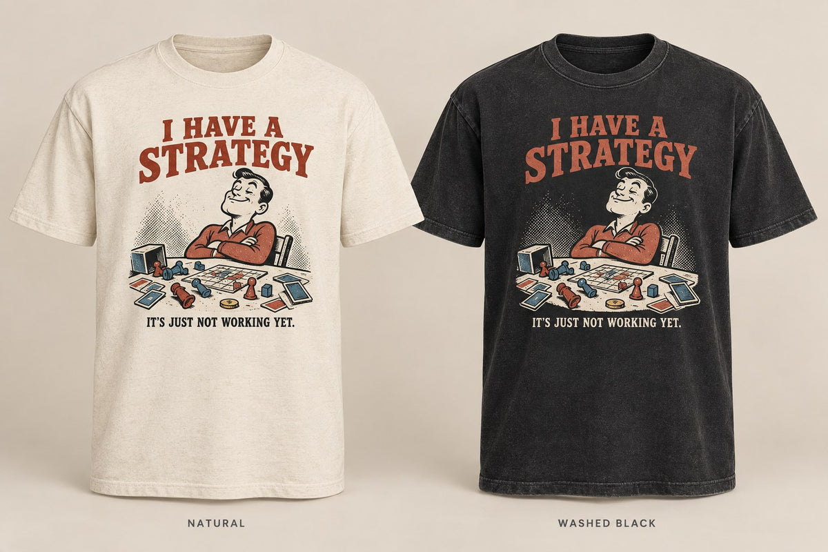 I Have a Strategy T-shirt mockup in Natural/Cream and Washed Black